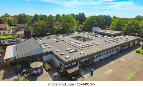 Aerial Photo Of School Building Roof