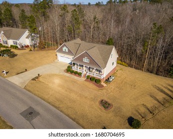 Aerial Photo Of Southern Home With Wrap Around Porch