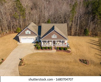 Aerial Photo Of Southern Home With Wrap Around Porch