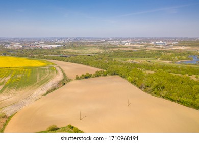 Aerial photo in the spring time of farmers fields located in the town of Leeds in West Yorkshire