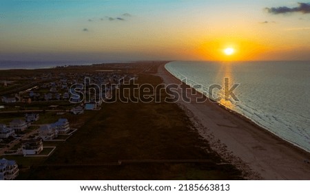 Aerial photo was taken at Galveston Island, Galveston, Tx at sunrise