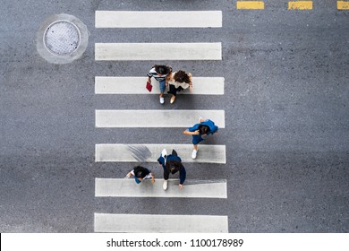 Aerial photo top view of people walk on street in the city over pedestrian crossing traffic road