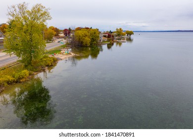 Aerial Photo Of Traverse City Michigan During The Fall. Autumn Colors Fill The Trees Creating A Beautiful, Colorful Landscape. 