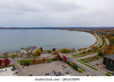 Aerial Photo Of Traverse City Michigan During The Fall. Autumn Colors Fill The Trees Creating A Beautiful, Colorful Landscape. 