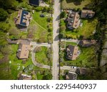 Aerial photo of village of Houses Residential Drone Above View Summer Blue Sky Estate Agent