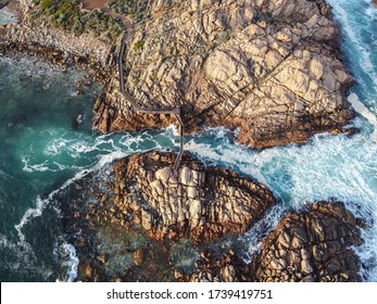 Aerial Photograph Of The Bridge Over The The Channel During Rough Seas At Canal Rocks. Canal Rocks, Yallingup - Western Australia