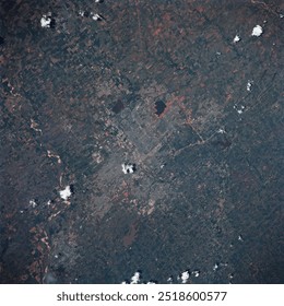 An aerial photograph capturing a vast, dark expanse of space. The image showcases the intricate patterns of stars and celestial objects, revealing the bea. Elements of this image furnished by NASA