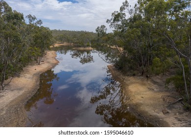 Aerial Photograph Of A Drought Affected Water Reservoir In Rural Australia