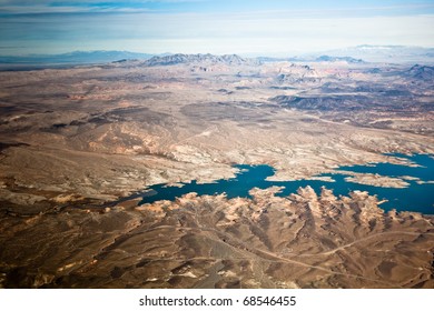 Aerial photograph of lake and rocky desert in western USA