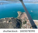 Aerial photograph of Nafplion the first capital of modern greece. Castle, city centre and sea