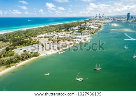 Aerial photograph of The Spit with the buildings of Surfers Paradise in the distance. Gold Coast, Queensland, Australia.