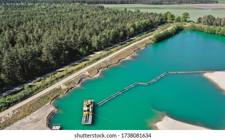 Aerial Photograph Of A Suction Dredger In A Wet Mining Area For Sand And Gravel, With Connected Pipeline To Remove The Sand