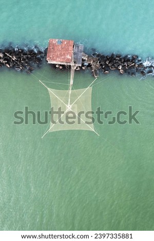 Aerial photographic documentation of the ancient fishing stations at the mouth of the Arno river Tuscany Italy 
