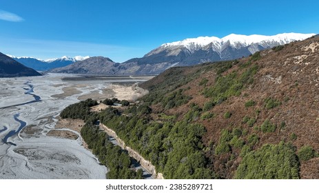 Aerial photography of the braided river with very little water flowing through the alpine Arthurs Pass - Powered by Shutterstock