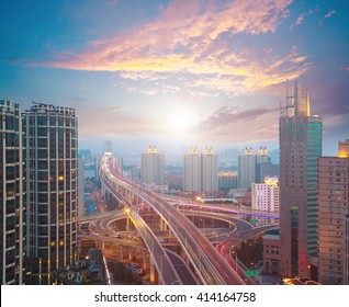 Aerial Photography At City Elevated Bridge Of Sunrise Pink Clouds