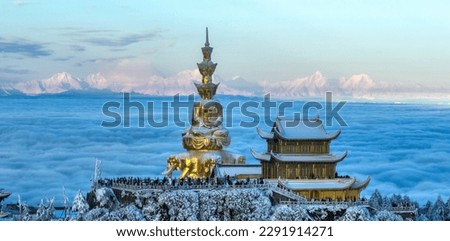 Aerial photography of snow covered Mount Emei in winter, the golden summit of Mount Emei in Sichuan(Huazang Temple), a famous Buddhist mountain in China.