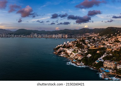 Aerial photography of the sunset in the Bay of Acapulco from the Las Brisas area