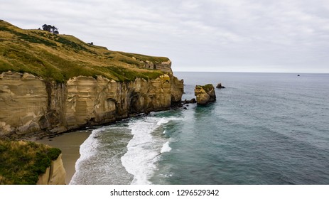 Aerial Photography Of Tunnel Beach In New Zealand, DUNEDIN, NEW ZEALAND Tunnel Beach, Dunedin, South Island Of New Zealand, Amazing Coast Line From Above With A Drone, Cliff Formations At Tunnel Beach