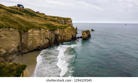 Aerial Photography Of Tunnel Beach In New Zealand, DUNEDIN, NEW ZEALAND Tunnel Beach, Dunedin, South Island Of New Zealand, Amazing Coast Line From Above With A Drone, Cliff Formations At Tunnel Beach