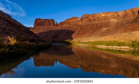 Aerial photography of Utah's mesmerizing rock formations capturing the breathtaking geological wonders of the state along the Colorado River. - Powered by Shutterstock