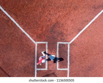 Aerial Photography Of Youth Baseball Player Up To Bat At Home Plate