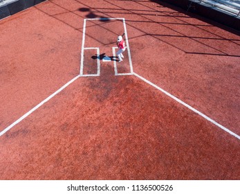 Aerial Photography Of Youth Baseball Player Up To Bat At Home Plate