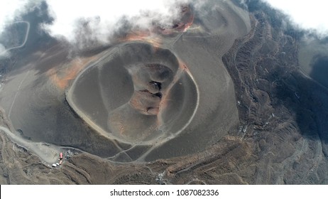 Aerial Picture Mount Etna Volcanic Crater One Of The Flank Craters Is Roughly Circular Depression In Ground Caused By Volcanic Activity And Is Typically Bowl-shaped Feature Also Showing People Walking