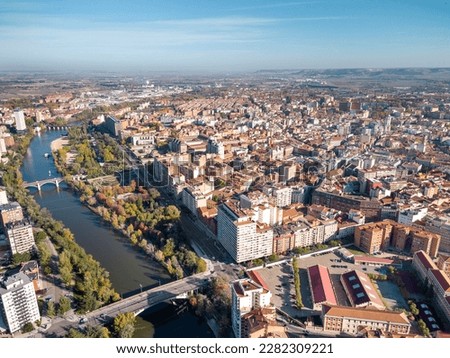 Aerial point of view of Valladolid city. View of River Pisuerga and Juan de Austria Bridge. At the right is the city center of Valladolid. Travel destination in Spain.  