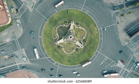 Aerial Rising Shot Of Plaza De Espana In Barcelona, Spain. Roundabout City Traffic, Top View