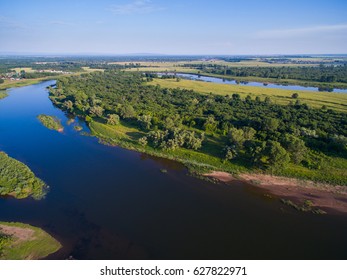 Aerial Russian countryside in a picturesque landscape among mountains and rivers