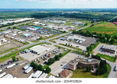 An Aerial Scene Of Busy Expressway And Truck Stop