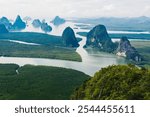 Aerial scenery view of mangroves forest, river canals and mountains. Bird