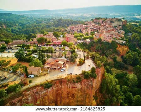 Aerial scenic view of Roussillon, Provence, France. Roussillon is known for its large ochre deposits found in the clay surrounding the village