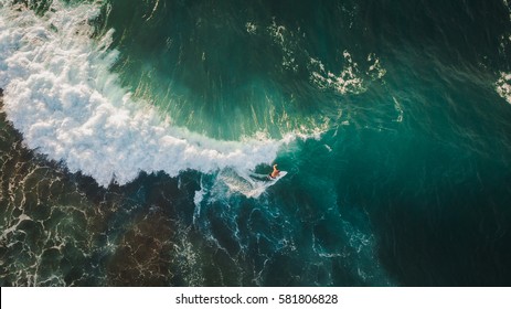 aerial shooting surfing - Shutterstock ID 581806828