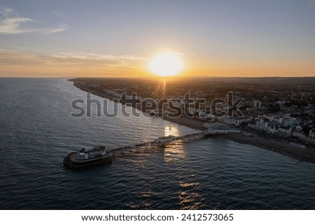 An aerial shot of a beautiful sunset in the England coastal city of worthing