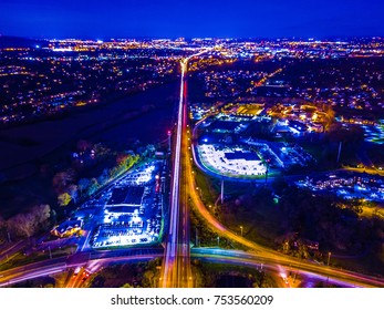 Aerial shot of Bethlehem,Pa at night with lights streaking on road - Shutterstock ID 753560209