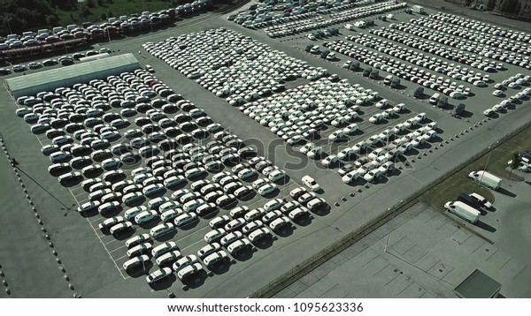 Aerial shot of a car\
manufacturer parking