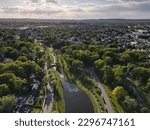 An aerial shot of the Clifton Park in New York City with the sun shining in the background