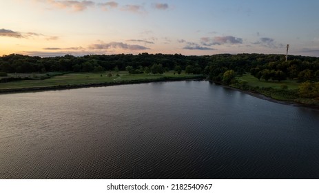 An Aerial Shot Of Dosoris Pond By The Long Island Sound In Glen Cove, NY During A Golden Sunrise. The Shot Was Taken With A Drone Camera With No People In View.