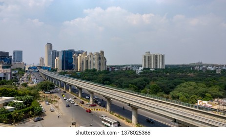 Aerial Shot Of Empty Rapid Metro Track In Urban Areas Of Delhi NCR, Gurgaon, Noida With Metro Running On The Tracks. DMRC Is Closing Metro Service For Janta Curfew Due To Coronavirus Covid-19 Shutdown