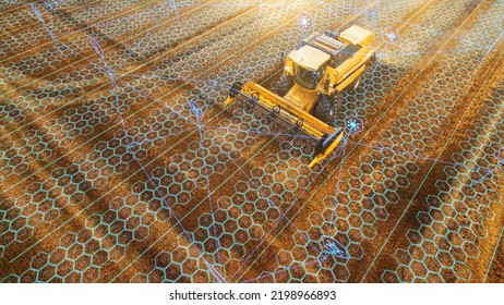 Aerial Shot: Harvester Working on Field. Digitalization of the Crops Growing Efficiency with AI Data Analysis. Futuristic Agriculture Concept of Computerized, Eco, Sustainable Harvesting. - Shutterstock ID 2198966893