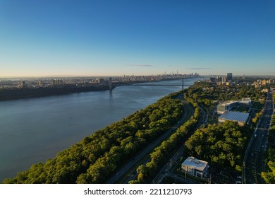 An Aerial Shot Of The Hudson River With The George Washington Bridge In The Distance