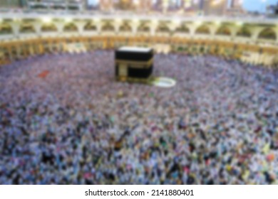 Aerial Shot Of Kaaba And Crowd Of People Worshiping In Blurry View