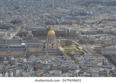 Aerial shot of a lavish gold dome to a historic chateau in Paris, France, viewed from the top of the Eiffel Tower on a sunny day - Powered by Shutterstock