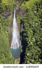 Aerial Shot Of Manawaiopuna Waterfall In Kauai Hawaii