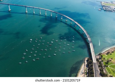 An aerial shot of the Mission bridge in San Diego, California, surrounded by the ocean - Powered by Shutterstock