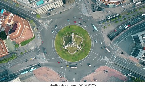 Aerial Shot Of Plaza De Espana In Barcelona, Spain. Roundabout City Traffic, Top View