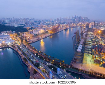 Aerial Shot Of Port Of Singapore At Night. Transportation And Logistic Concept