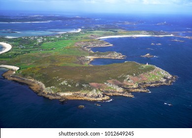 Aerial Shot Of The Private Island Of Tresco, Isles Of Scilly, England Shown In Sunshine With White Beaches And Rocky Cliffs