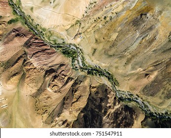 Aerial Shot Of The River Among The Desert Mountains
